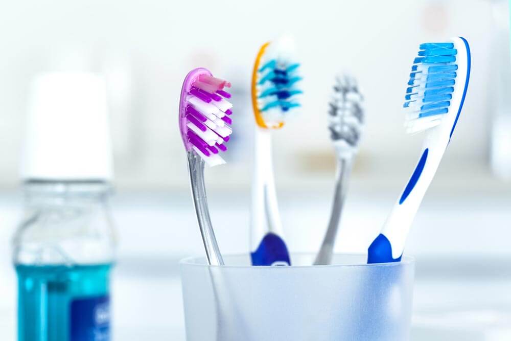 Tooth brushes in glass