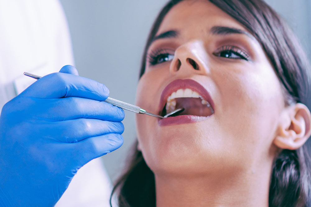 Woman getting dental treatment