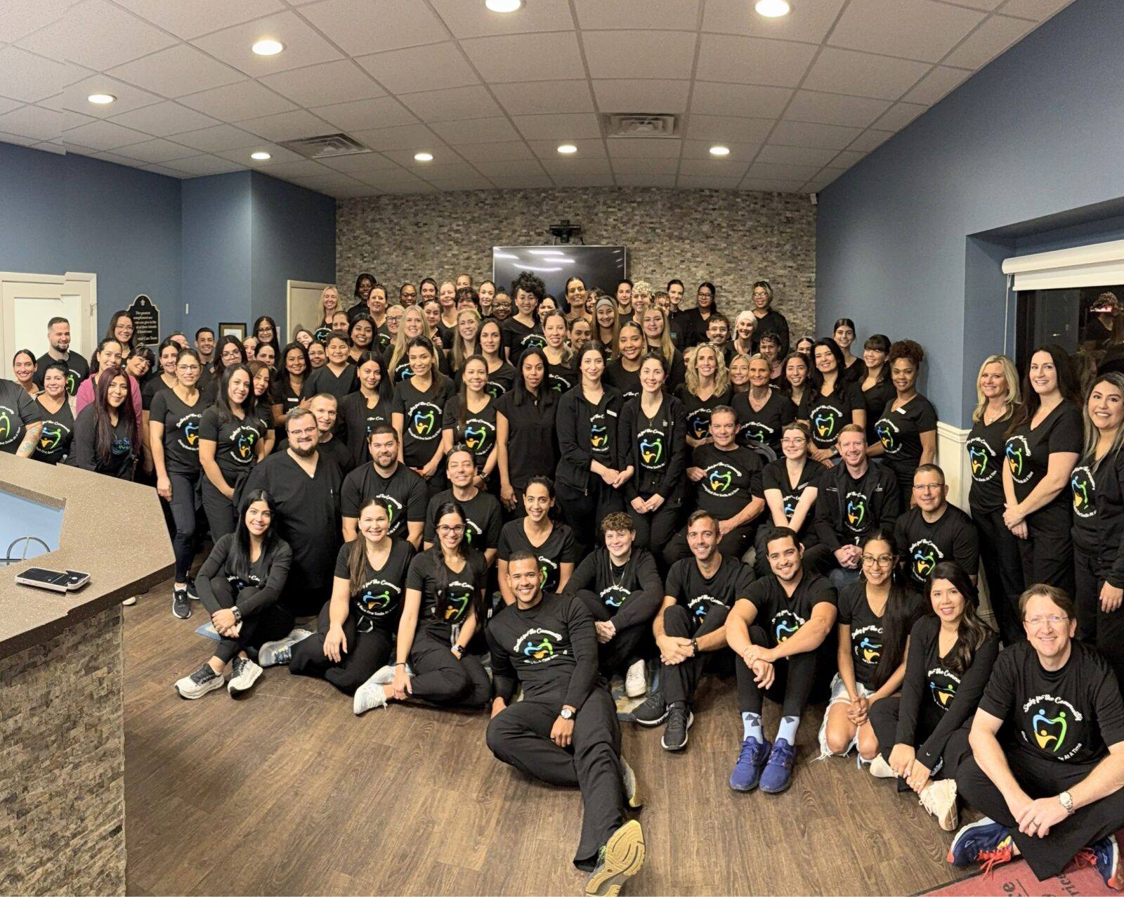 A large group of dental volunteers posing for a picture
